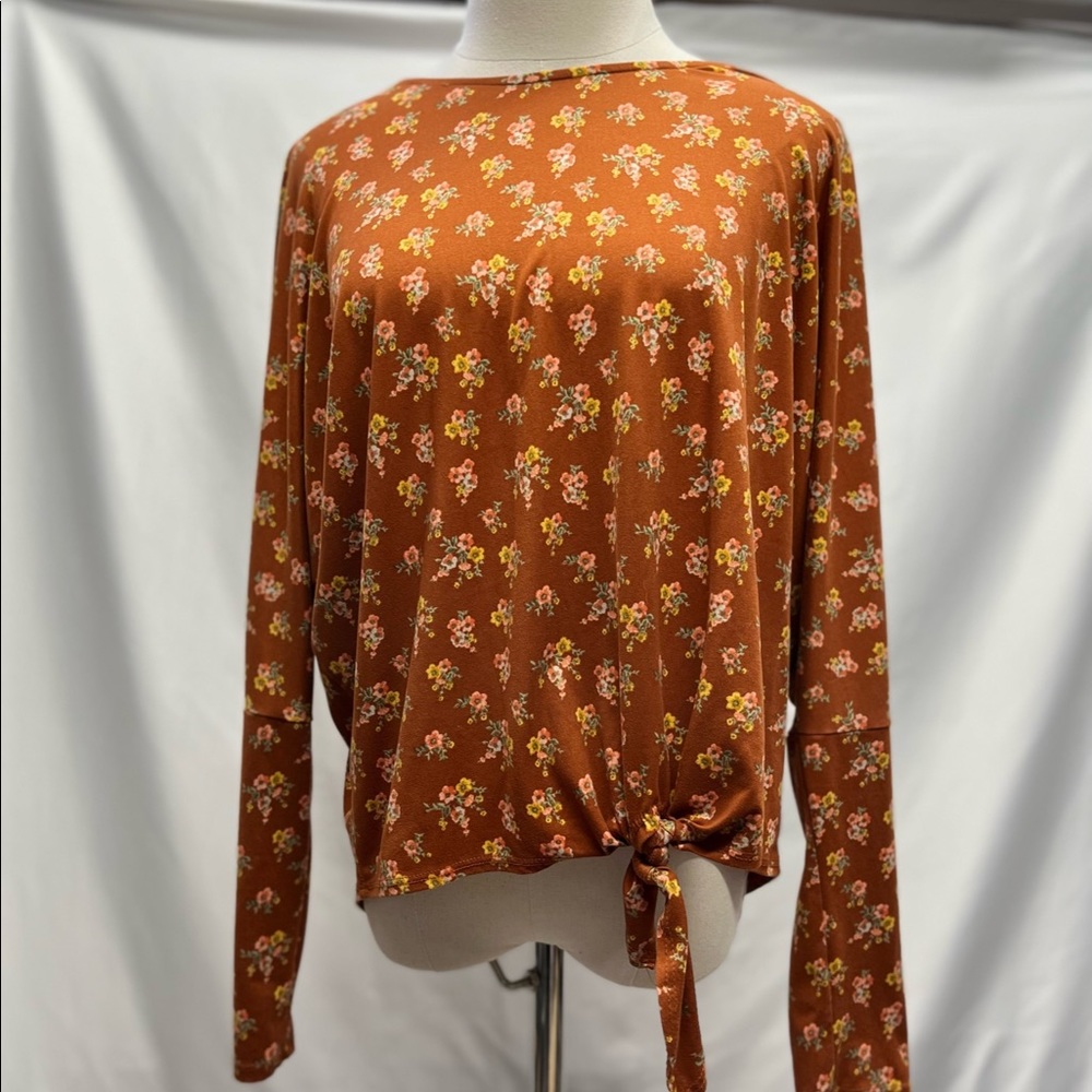 This shirt is from IZ Byer and size Medium